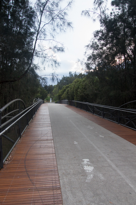 Across this bridge was the picnic area, the basketball ring and then the exit to the park.