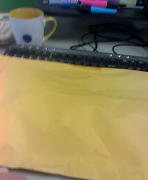 But what's this in the internal mail? A blurry envelope from Chow? What could be inside? More LEGO?!
